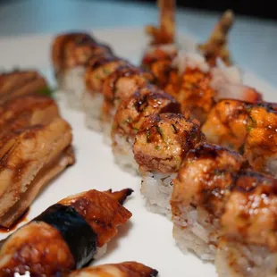 a variety of sushi on a plate