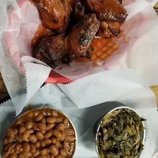 Wings, smoked baked beans and collard greens.