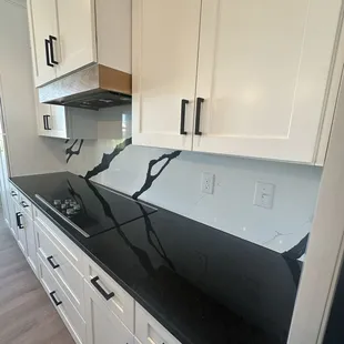 Kitchen, they did the counter and the back splash that is STUNNNNNING!!