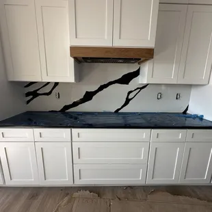 Kitchen, they did the counter and the back splash that is STUNNNNNING!!