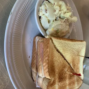 The club sandwich with potato salad