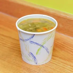 a paper cup of soup
