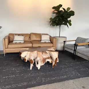 a living room with couches and a coffee table