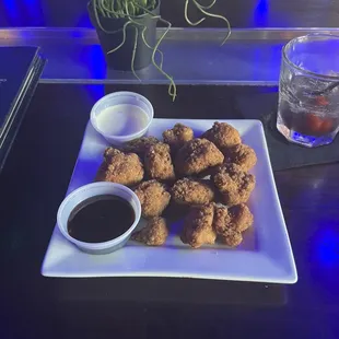 fried chicken nuggies and dipping sauce
