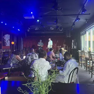 a group of people sitting at a table