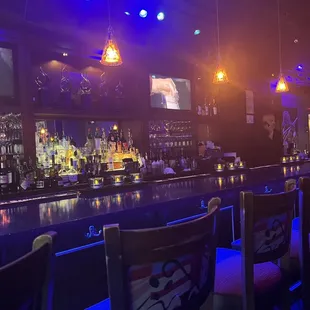 a bar with blue lighting