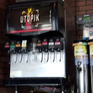 a soda dispenser and a beer dispenser
