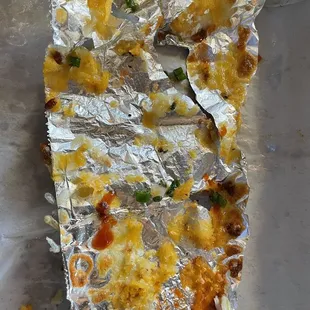 Cheese tot upgrade with 75% of the cheese fused with the foil.