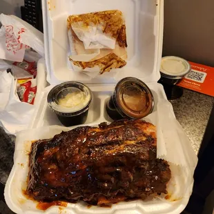 ribs in a styrofoam container