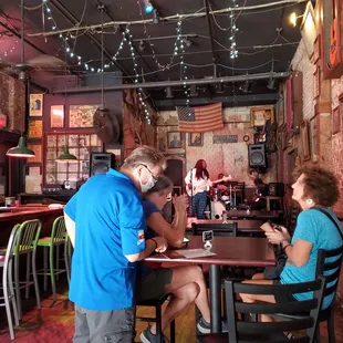 a man and woman sitting at a table