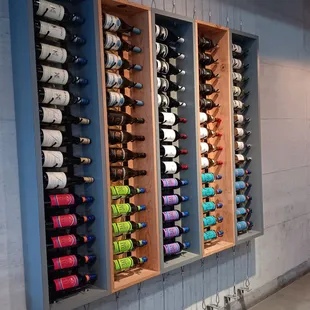 a wall of wine bottles