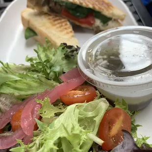 a sandwich and salad on a plate