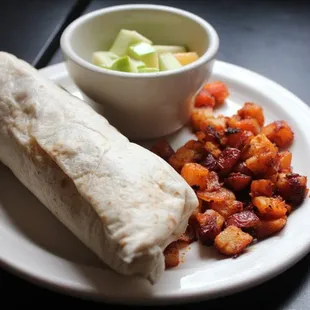 Breakfast Burrito with fruit and potatoes