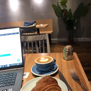 Flat white and croissant