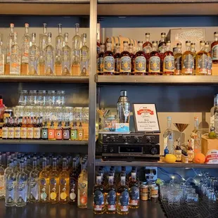 Behind the bar. Showing off the awards.