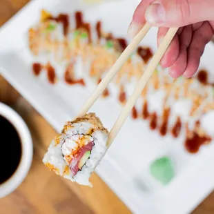 Join us at our Sushi Bar for hand-cut Rolls and Sake!