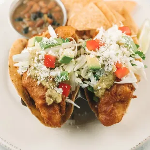 Our Fish Tacos pair perfectly with our Serrano Margarita!