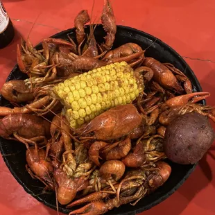 Spicy legit crawfish. Gotta suck the head. Wish sausage was included.