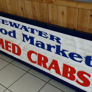 a sign for seafood market