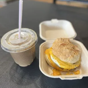 Breakfast biscuit with turkey sausage and an iced au lait.