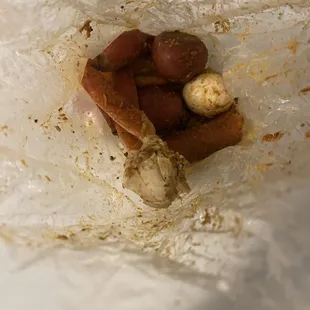 Leftover from only one cluster of crab legs, sausage, egg, four potatoes, 6 shrimps