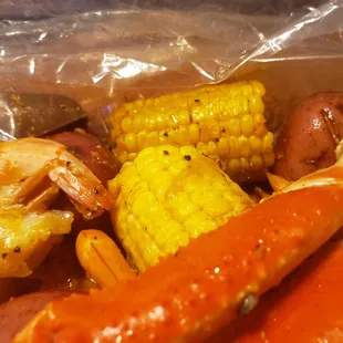 Crab bag with corn, potatoes, and andouille sausage.