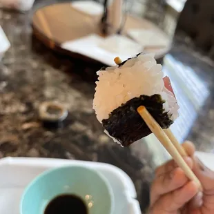 Sushi &quot;rolls&quot; where the seaweed doesn&apos;t wrap all the way around. Every roll is like this. Disappointing.