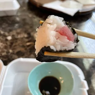 Sushi &quot;rolls&quot; where the seaweed doesn&apos;t wrap all the way around. Every roll is like this. Disappointing.