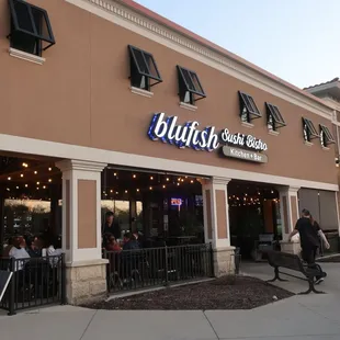 Storefront and partially occupied patio.