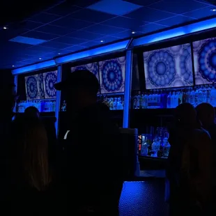 a group of people watching televisions