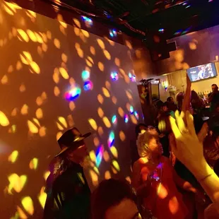 a crowd of people dancing and dancing