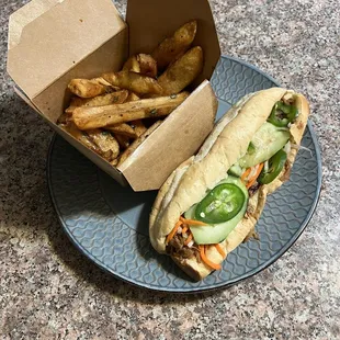 -Steak Cut Garlic Fries with Garlic Butter Oyster Sauce -Pulled Pork Banh Mi