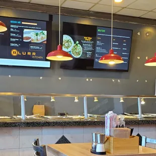 EDM music playing in the background, pleasant aroma of Asian fusion cuisine from the hot table...