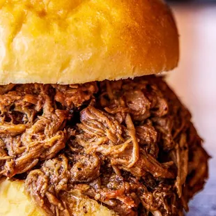 Blu's Barbeque homemade Smoked Pulled Pork Sandwich.  Available up to 3x meat so just how high do you want it piled.