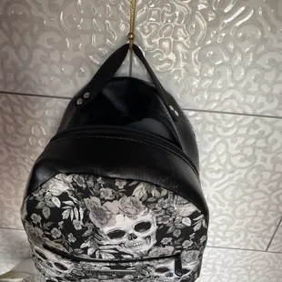 Fancy hooks under the bar for your bag!