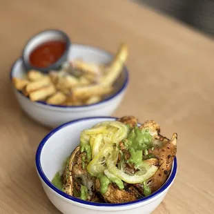 Greek Fries / Charred Cauliflower with green tahini, preserved lemon.