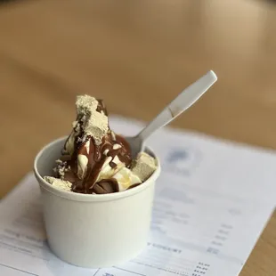 Frozen yogurt swirl with chocolate tahini magic shell and vanilla halva &amp; honey