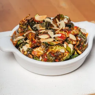 a dish of broccoli and other vegetables