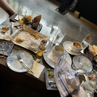 a table full of food and drinks