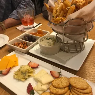 Cheese plate and truffle fries on happy hour!