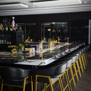 a bar with a marble counter top