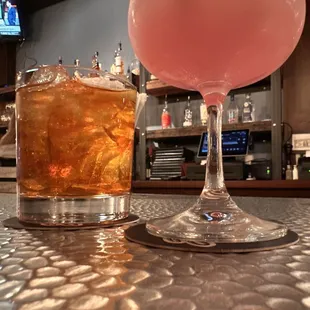a drink and a beverage on a bar