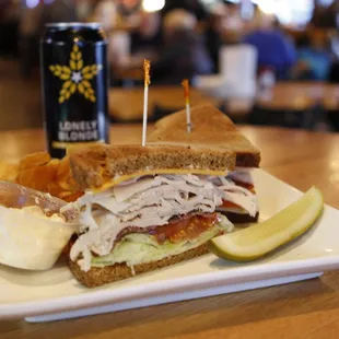 a turkey sandwich and chips