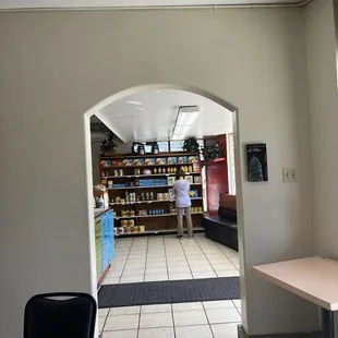 Seating in here and looking out to the mini market and ordering area