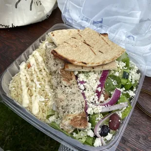 a salad in a plastic container