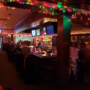 people sitting at the bar