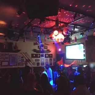 a crowd of people at a bar