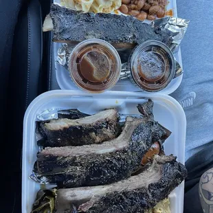 a tray of ribs and beans