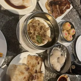 Shrimp har gow, shu mai, roast duck, tripe, shrimp rice paper roll, turnip cake