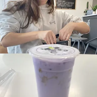 a woman sitting at a table